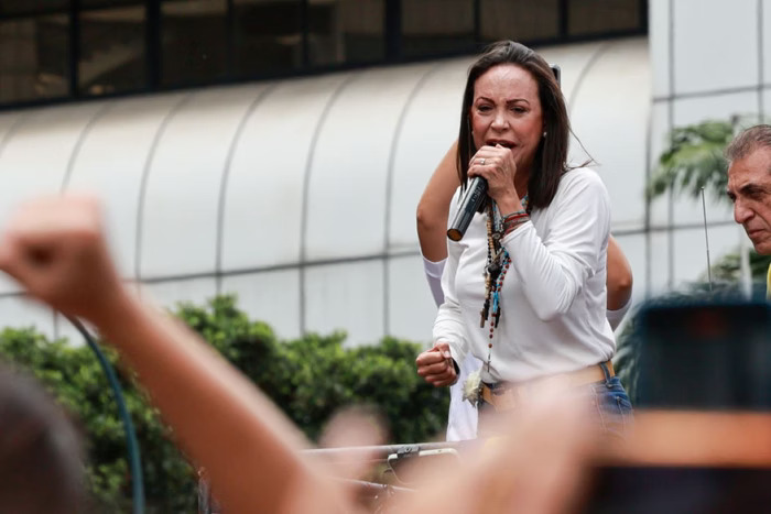 María Corina Machado discursando - Foto (Reprodução)